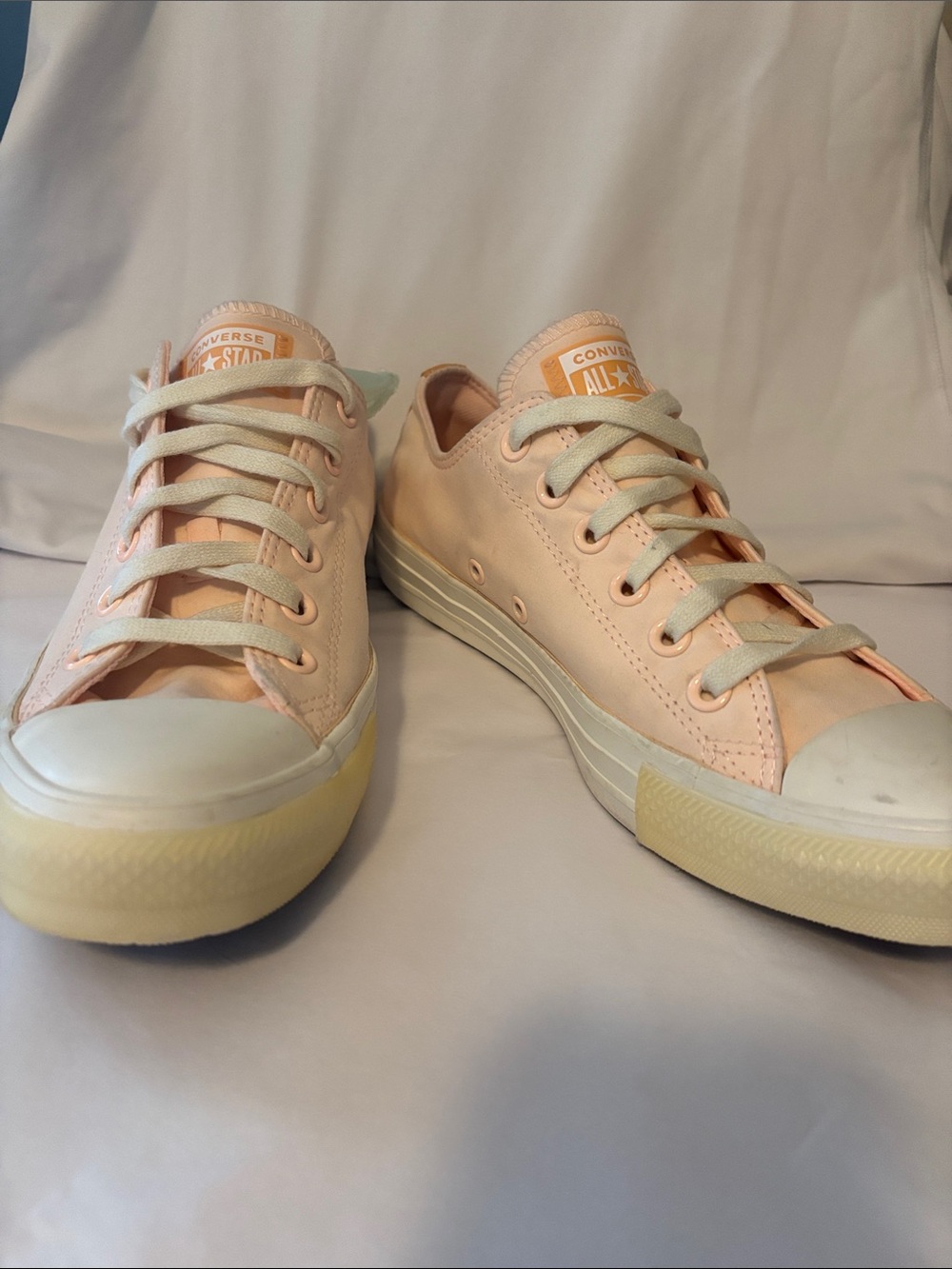 Converse Low Top Sneakers in Pale Pink and Off-White